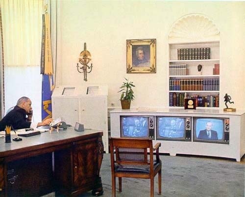 LBJ watching TV in the Oval Office