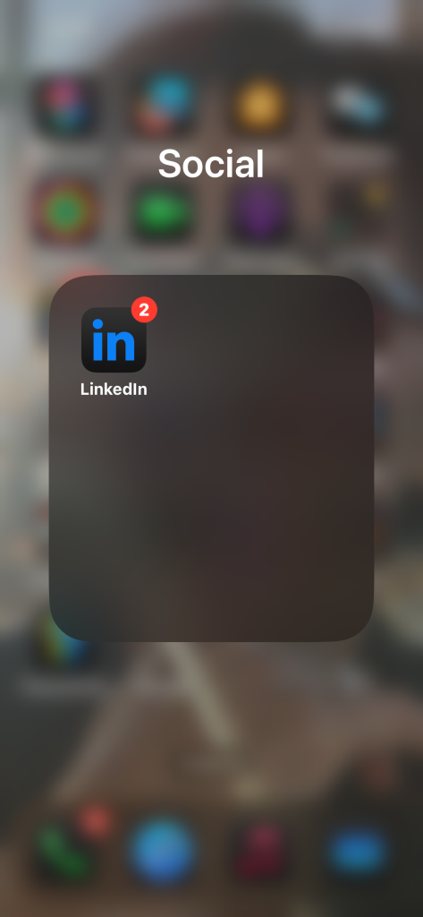 A smartphone folder with one social media icon