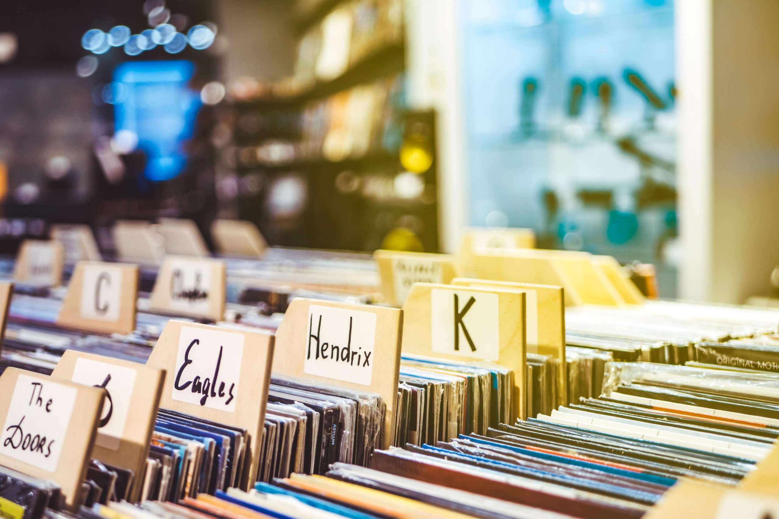Explore the charm of a vintage vinyl record store with diverse classic albums on display.